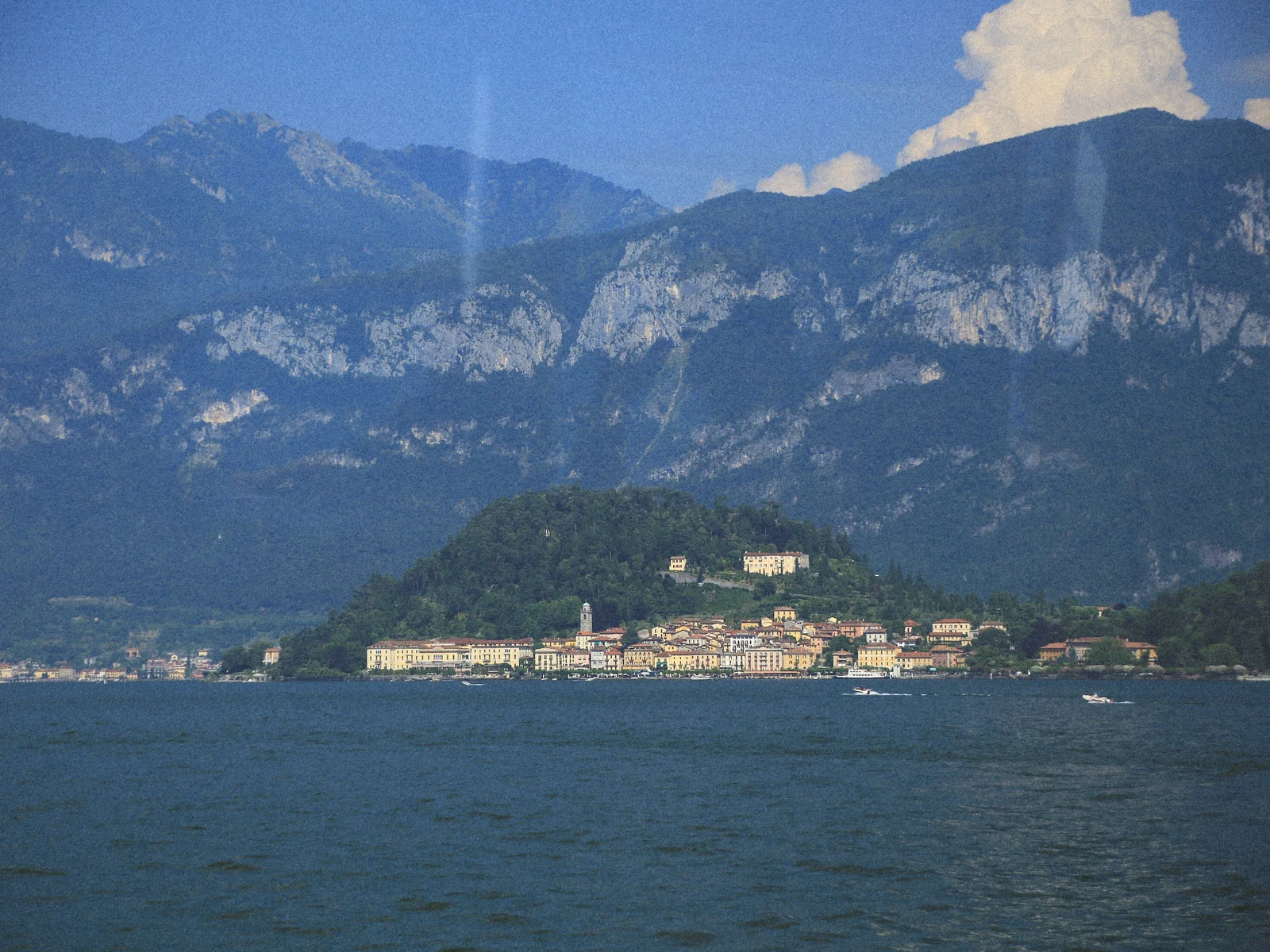 Pastel villas of Bellagio rising from the shore of Lake Como