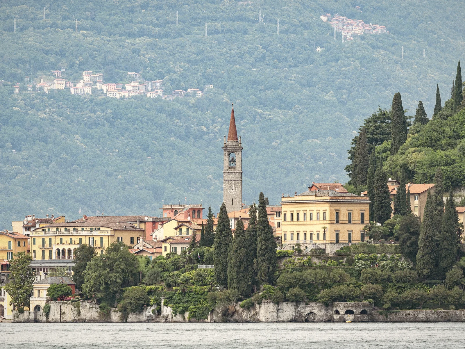 Colourful houses of Varenna stacked above the lake