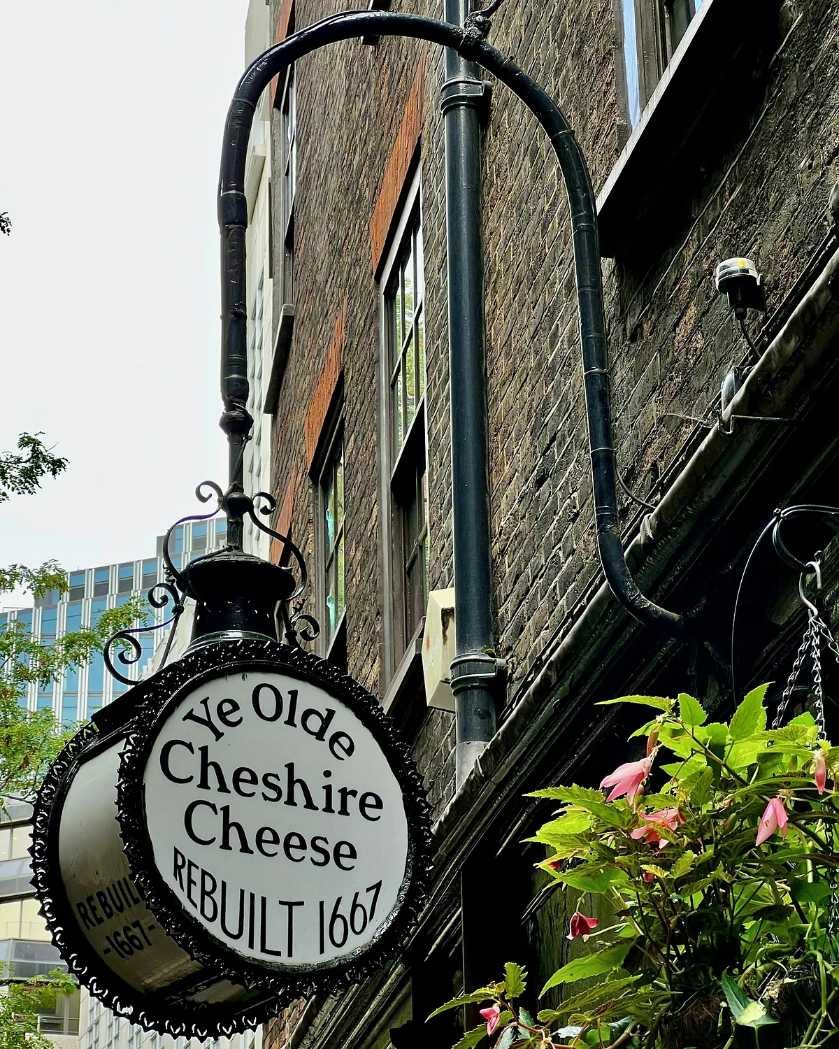 The round hanging sign of Ye Olde Cheshire Cheese, rebuilt 1667, on Fleet Street