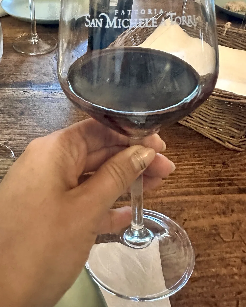 A glass of red wine at a Chianti Classico tasting