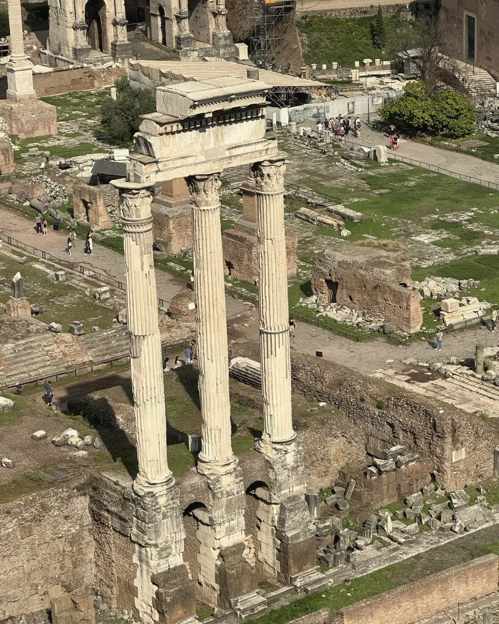 The three standing columns of the Temple of Castor and Pollux above the ruins of the Roman Forum