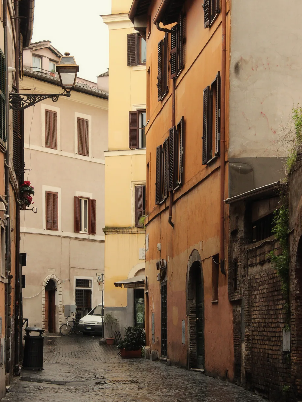 The ochre and terracotta houses of Vicolo del Cinque in Trastevere