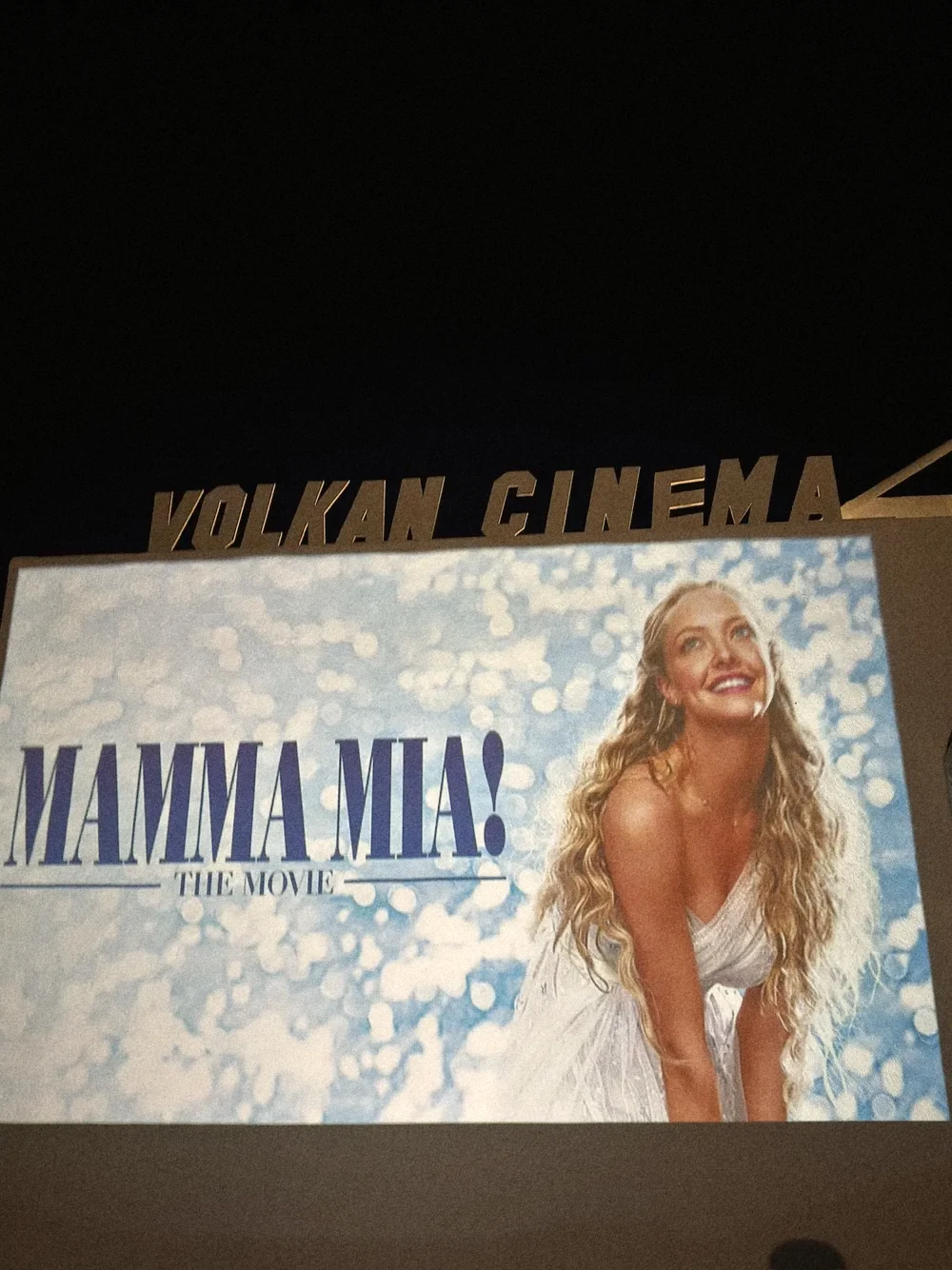The Mamma Mia title on the open-air screen at Volkan cinema